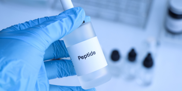 Image of a person holding peptide