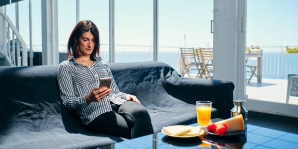 An executive woman taking breakfast