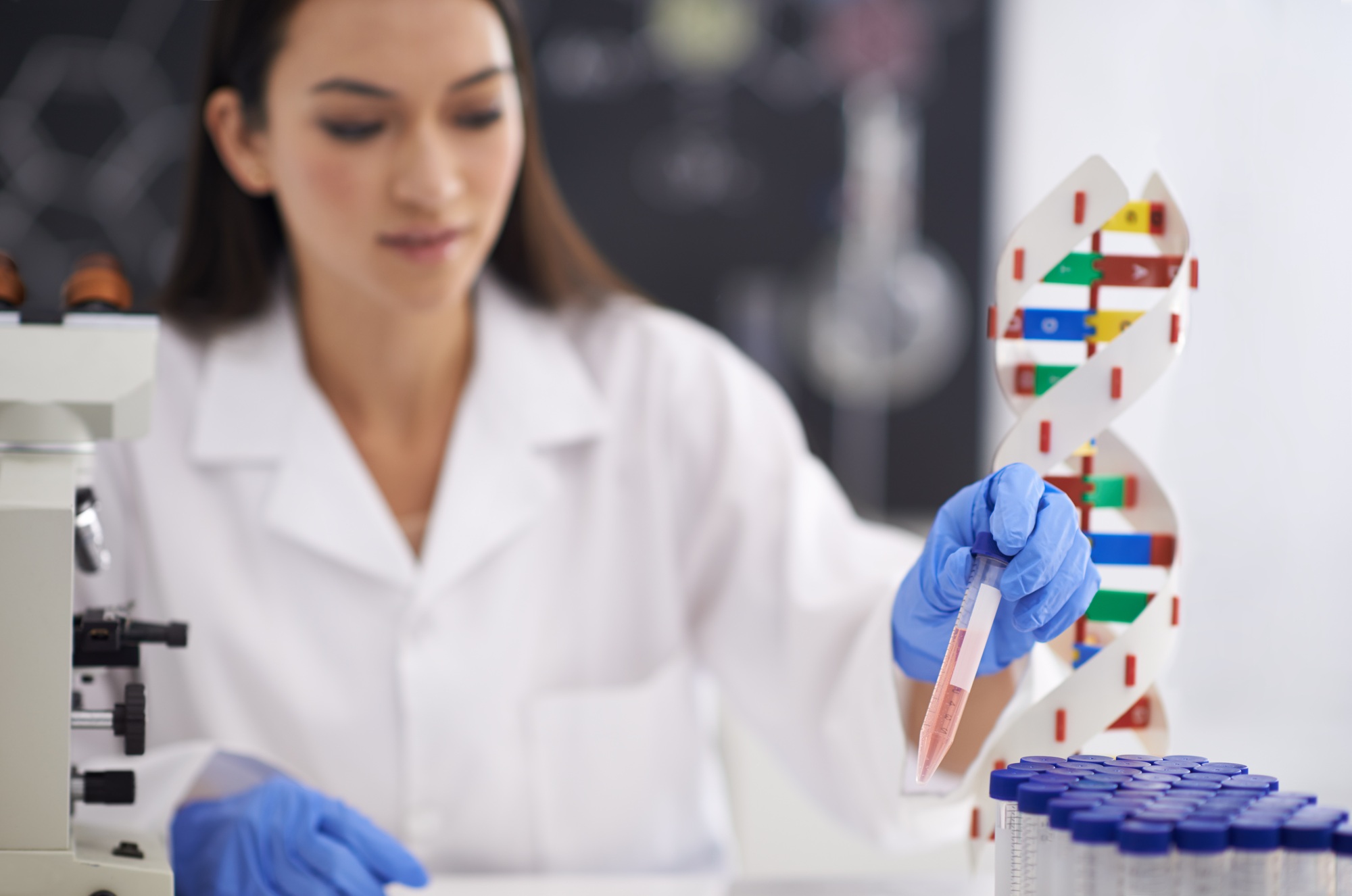 Genetics is her passion. Shot of a female scientist observing a sample in a test tube.